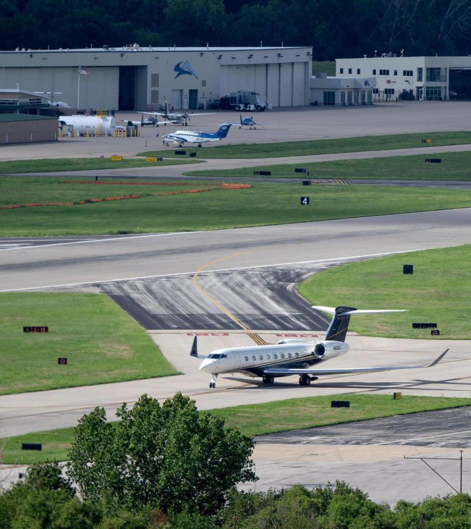 A Gulfstream G650 business jet taxis to a runway for takeoff at the Charles B. Wheeler Downtown Airport.