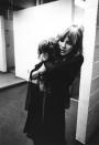 <p>Stevie Nicks of Fleetwood Mac poses backstage in New Haven holding her dog on October 1, 1975.</p>