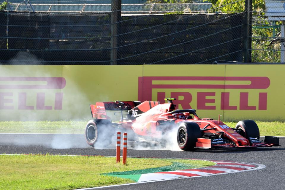 Smoke comes from the car of Ferrari's Monegasque driver Charles Leclerc during the Formula One Japanese Grand Prix final at Suzuka on October 13, 2019. (Photo by Toshifumi KITAMURA / AFP) (Photo by TOSHIFUMI KITAMURA/AFP via Getty Images)