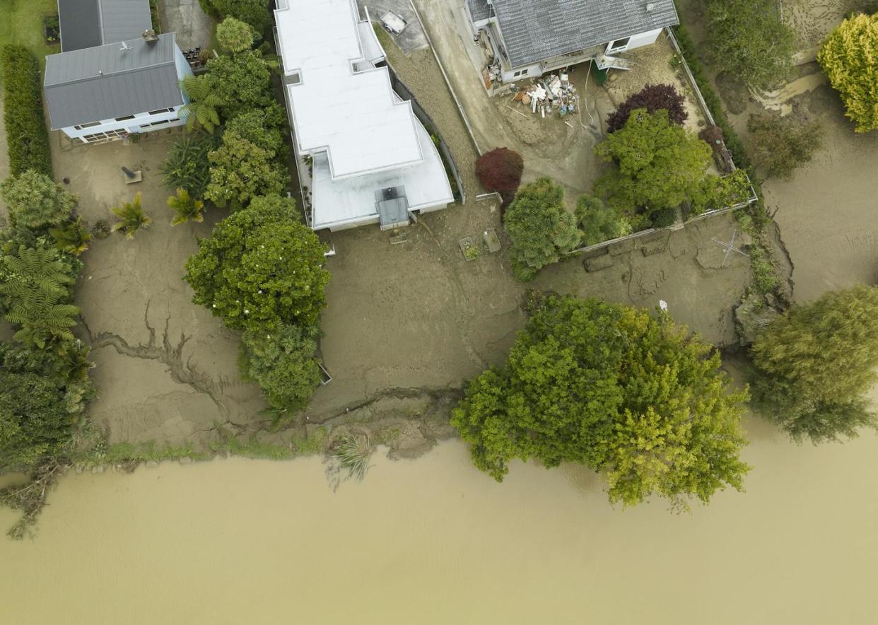 <a href="https://www.gettyimages.com.au/detail/news-photo/homes-belongings-inundated-by-mud-silt-following-cyclone-news-photo/1466866824?adppopup=true" rel="nofollow noopener" target="_blank" data-ylk="slk:Phil Yeo/Getty Images;elm:context_link;itc:0;sec:content-canvas" class="link ">Phil Yeo/Getty Images</a>