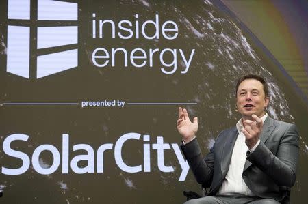 Elon Musk, Chairman of SolarCity and CEO of Tesla Motors, speaks at SolarCityÕs Inside Energy Summit in Manhattan, New York in this October 2, 2015, file photo. REUTERS/Rashid Umar Abbasi/Files