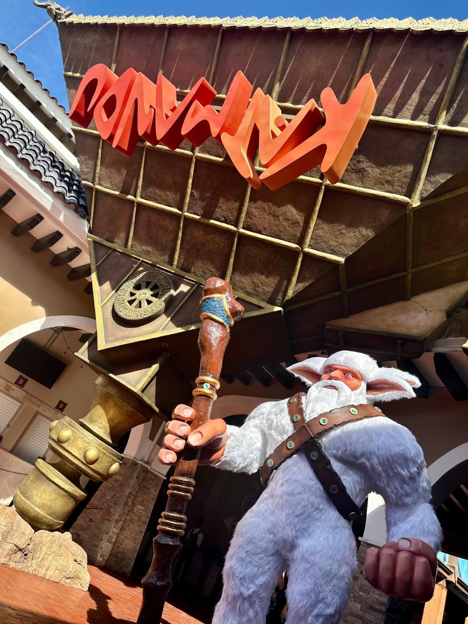 Katmandu entrance with man with animal ears statue in front of it