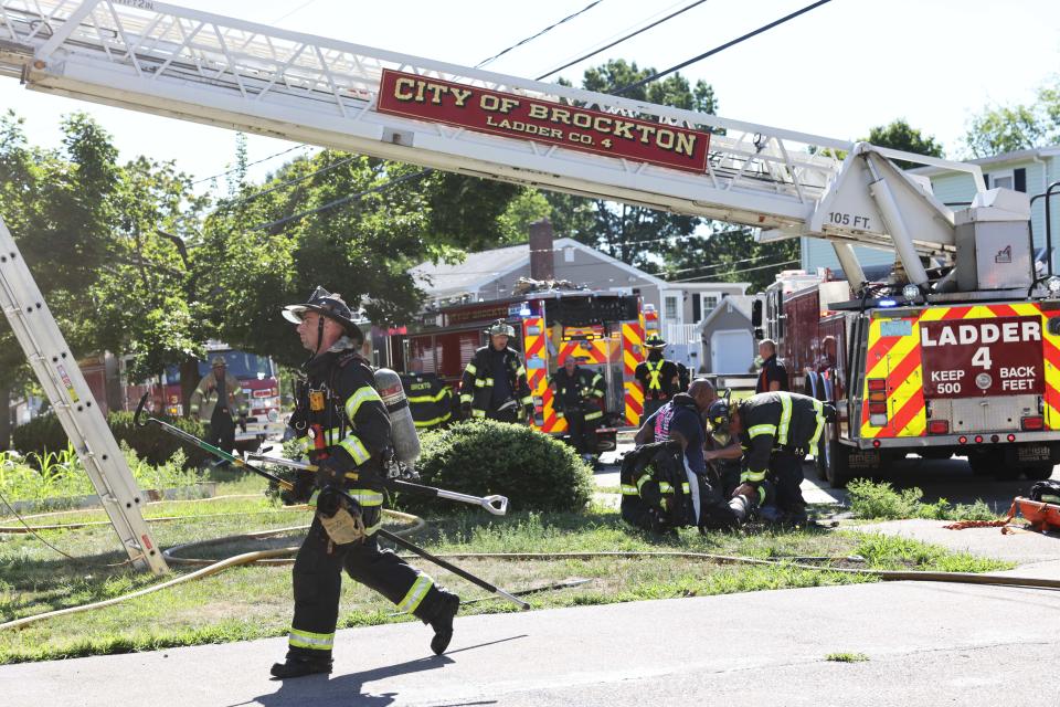 Brockton firefighters battle a house fire at 135 Maplewood Circle on Sunday, Aug. 14, 2022.