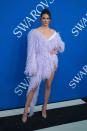 <p>The reality star donned an Alexandre Vauthier Couture dress made of lavender feathers for the fashion event, June 2018.</p>