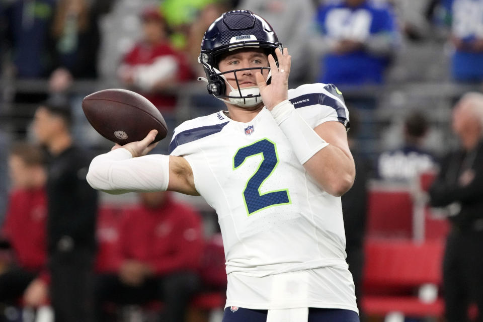 FILE -0 Seattle Seahawks quarterback Drew Lock (2) warms up before an NFL football game against the Arizona Cardinals, Sunday, Jan. 8, 2024, in Glendale, Ariz. The New York Giants have agreed with Lock on a one-year contract worth $5 million. He will start the year competing with Tommy DeVito to be the backup quarterback to Daniel Jones. (AP Photo/Rick Scuteri, File)