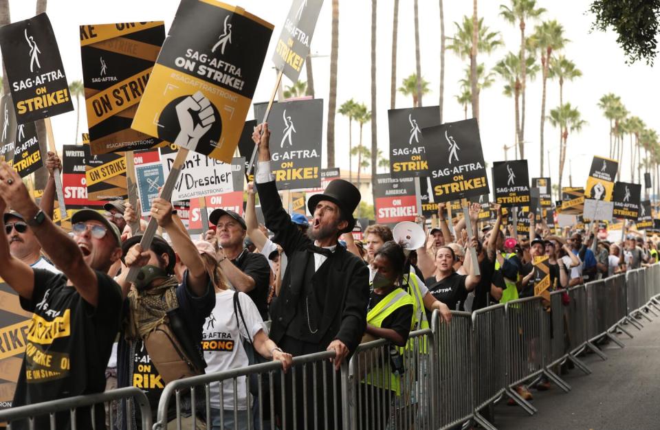 SAG-AFTRA members and supporters picket outside Paramount Studios