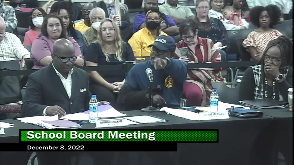 Bennie Jackson Jr. (center), vice president for the South Brevard NAACP, confronts Sheriff Wayne Ivey at a Dec. 8 School Board meeting over a video filmed in front of the county jail, in which Ivey declared a "brand new day" for discipline in Brevard schools.