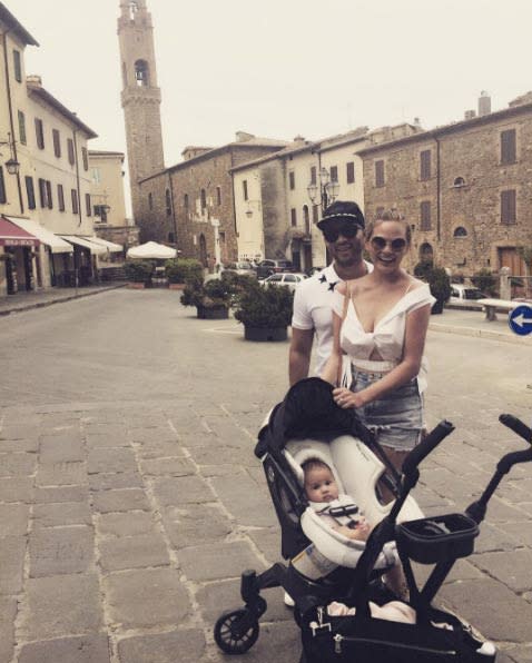 Baby Luna Stephens in stroller by her parents John Legend and Chrissy Teigen