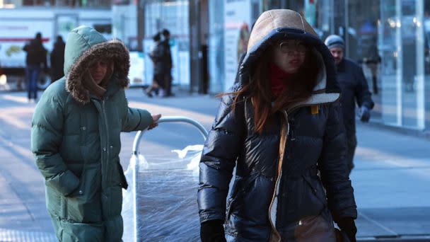 PHOTO: People bundled up walk in midtown Manhattan as bitter cold temperatures moved into much of the northeast United States in New York City, Feb. 3, 2023. (Mike Segar/Reuters)