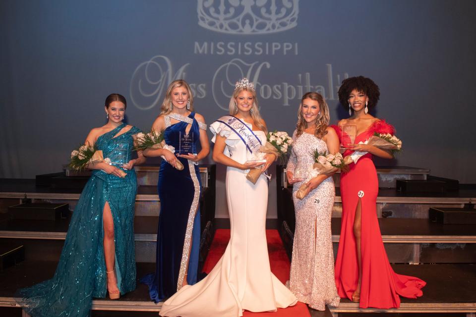 Miss Wayne County Hospitality Abney Grace Pittman, center, was named Mississippi Miss Hospitality on Saturday, July 15, 2023, at the Saenger Theater in Hattiesburg, Miss. Pictured with Pittman, from left, are fourth alternate Gracie Bassett of Madison County; second alternate Maddie Grace Lightsey of Hattiesburg; first alternate Loren Wade of Petal; and third alternate Gabby Bell of Pontotoc County.