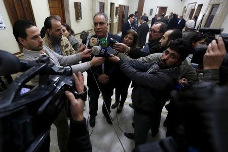 FILE PHOTO: Homs governor Talal al-Barazi speaks to reporters during the release of prisoners at the Homs Governorate Council building, Syria December 7, 2015. REUTERS/Omar Sanadiki/Files