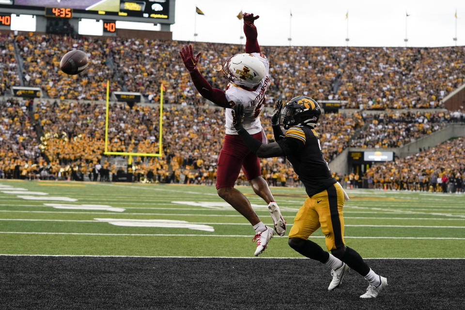 Iowa defensive back Terry Roberts (2) breaks up a pass intended for Iowa State wide receiver Xavier Hutchinson (8) during the first half of an NCAA college football game, Saturday, Sept. 10, 2022, in Iowa City, Iowa. (AP Photo/Charlie Neibergall)