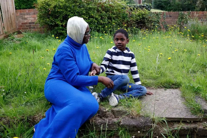 Dare Olaifa-Oyeniyi and Abdul-Quddus Oyeniyi pose for photos in his house in Barnehurst in south east London, Britain 12 June 2024. Facundo Arrizabalaga/MyLondon