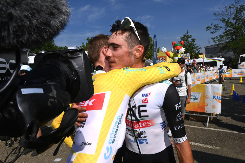 ABTWILL SWITZERLAND  JUNE 18 LR Overall race winner Mattias Skjelmose Jensen of Denmark and Team TrekSegafredo  Yellow Leader Jersey and stage winner Juan Ayuso of Spain and UAE Team Emirates react after the 86th Tour de Suisse 2023 Stage 8 a 257km individual time trial from St Gallen to Abtwil  UCIWT  on June 18 2023 in Abtwil Switzerland Photo by Tim de WaeleGetty Images