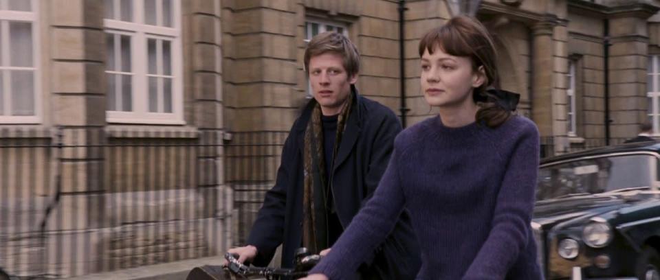 <p>Carey Mulligan’s Jenny, might have put off studying at Oxford for an older man before realising the importance of an education. She cycles through the streets of the university campus showing off her perfected 60s Parisian student look: a warm oversized jumper with her hair tied up in a black bow.</p><p>[Photo: Screengrab]<br></p><p><br></p>