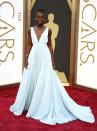 Lupita Nyong'o, best supporting actress nominee for her role in "12 Years a Slave", wearing a Fred Leighton headband and a Prada gown prepares to walk the red carpet at the 86th Academy Awards in Hollywood, California March 2, 2014. REUTERS/Lucas Jackson (UNITED STATES TAGS: ENTERTAINMENT) (OSCARS-ARRIVALS)