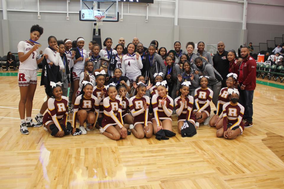 Detroit Renaissance poses for a team photo after beating Detroit Cass Tech for the Detroit Public School League championship on Sunday, Feb. 19, 2023, at the Wayne State Fieldhouse in Detroit.