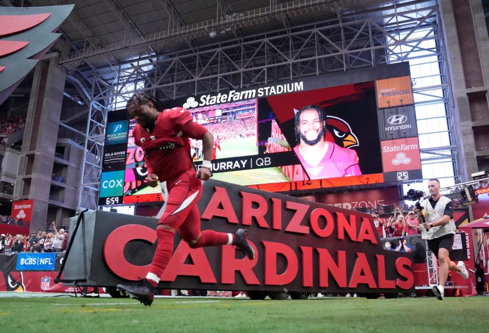 Sep 11, 2022; Glendale, Arizona, United States; Arizona Cardinals quarterback Kyler Murray (1) is introduced before playing against the Kansas City Chiefs at State Farm Stadium.