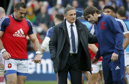 Rugby Union - France vs Italy - Stade de France, Paris, France - 6/2/16. French rugby union team coach Guy Noves (C) speaks with staff members and players just before a Six Nations tournament match. REUTERS/Gonzalo Fuentes