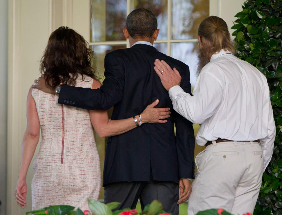 <p>President Barack Obama walks with Jani Bergdahl, left, and Bob Bergdahl, right, to the Oval Office of the White House in Washington, Saturday, May 31, 2014, after speaking about the release of their son, U.S. Army Sgt. Bowe Bergdahl. Bergdahl, 28, had been held prisoner by the Taliban since June 30, 2009. He was handed over to U.S. special forces by the Taliban in exchange for the release of five Afghan detainees held by the United States. (AP Photo/Carolyn Kaster) </p>
