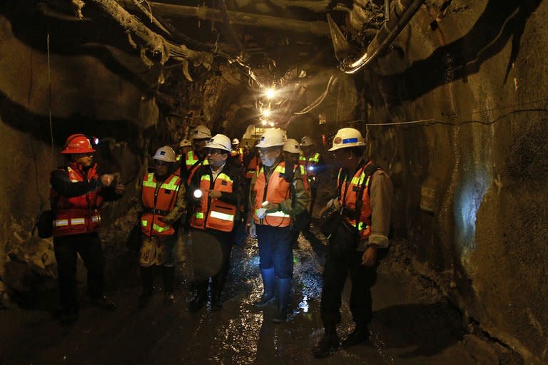 This file photo, received on May 19, 2013, shows officials of Freeport Indonesia inspecting the tunnel at Big Gossan in Timika at the Grasberg mine, one of the world's biggest gold and copper mines high in the mountains of rugged Papua province. On May 14, a tunnel caved in at the mine, killing 28 of 38 workers undergoing safety training