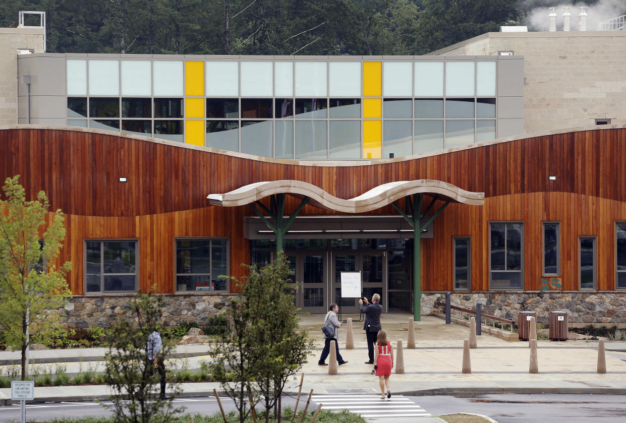 People attend an open house at the new Sandy Hook Elementary School in Newtown, Conn., in July 2016. Students attended the first day of classes there on Aug. 29, 2016. (Photo: Mark Lennihan/AP)