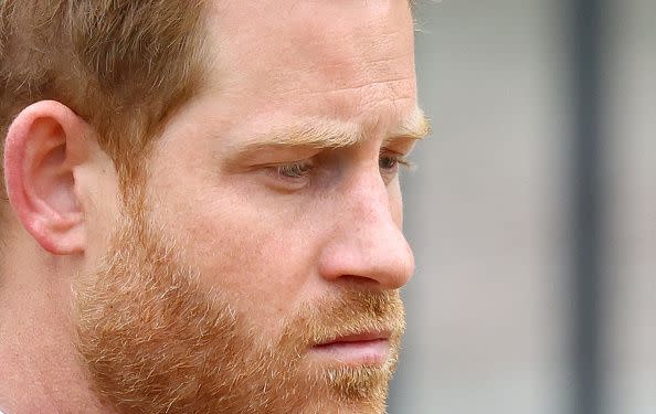 LONDON, ENGLAND - SEPTEMBER 19: Prince Harry, Duke of Sussex, reacts as he attends the State Funeral of Queen Elizabeth II at Westminster Abbey on September 19, 2022 in London, England. Members of the public are able to pay respects to Her Majesty Queen Elizabeth II for 23 hours a day from 17:00 on September 18, 2022 until 06:30 on September 19, 2022. Queen Elizabeth II died at Balmoral Castle in Scotland on September 8, 2022, and is succeeded by her eldest son, King Charles III. (Photo by Hannah McKay- WPA Pool/Getty Images)