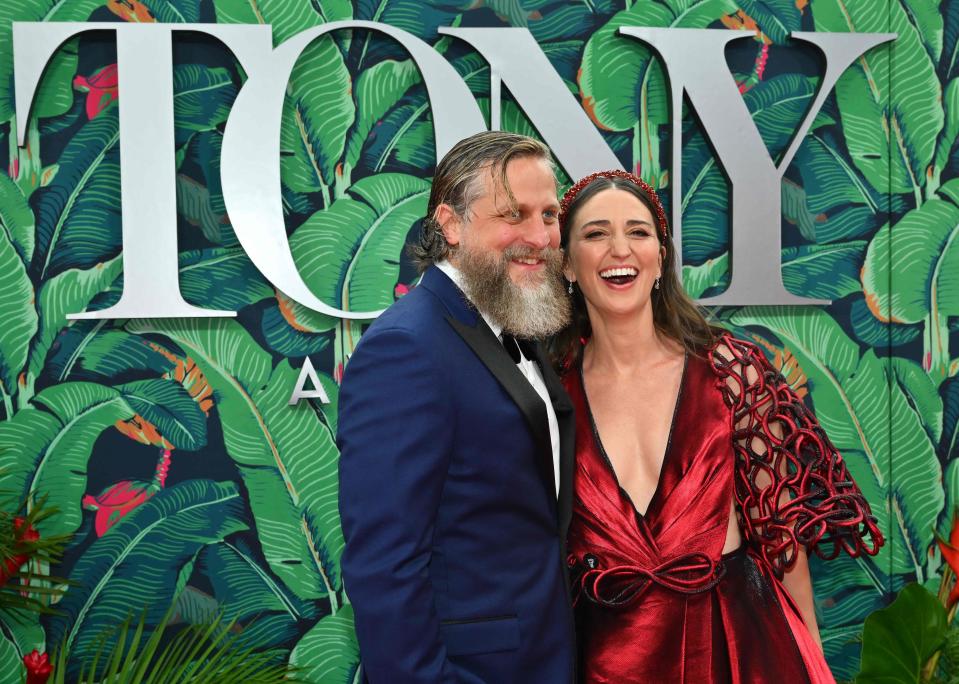 Sara Bareilles, right, and her fiancé, actor Joe Tippett, walk the Tony Awards red carpet in New York Sunday.