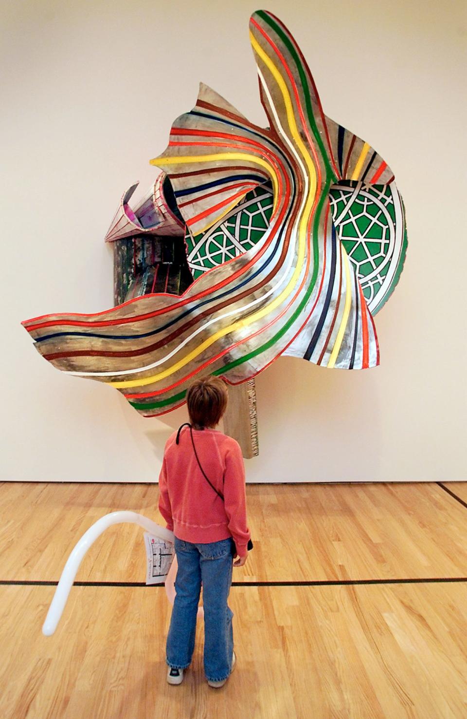 Jessica Noe, 11, looks at "The Spirit-Spout" by Frank Stella during the opening day of the new Oklahoma City Museum of Art Saturday, March 16, 2002.
