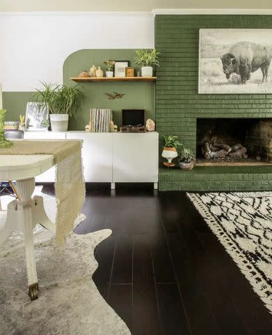 <p><a href="https://www.cassiebustamante.com/how-to-patch-paint-a-brick-fireplace-our-green-fireplace-makeover/" data-component="link" data-source="inlineLink" data-type="externalLink" data-ordinal="1">Cassie Bustamante</a></p>