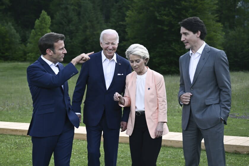 From left, President Emmanuel Macron, US President Joe Biden, European Commission President Ursula von der Leyen and Canada's Prime Minister Justin Trudeau leave after posing for a group photo , during the G7 Summit, at Castle Elmau in Kruen, near Garmisch-Partenkirchen, Germany, Sunday, June 26, 2022. The Group of Seven leading economic powers are meeting in Germany for their annual gathering Sunday through Tuesday. (Brendan Smialowski/Pool via AP)