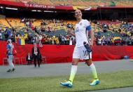 Jun 22, 2015; Edmonton, Alberta, CAN; United States midfielder Carli Lloyd (10) reacts as she walks off the field after beating Colombia in the round of sixteen in the FIFA 2015 women's World Cup soccer tournament at Commonwealth Stadium. Mandatory Credit: Michael Chow-USA TODAY Sports