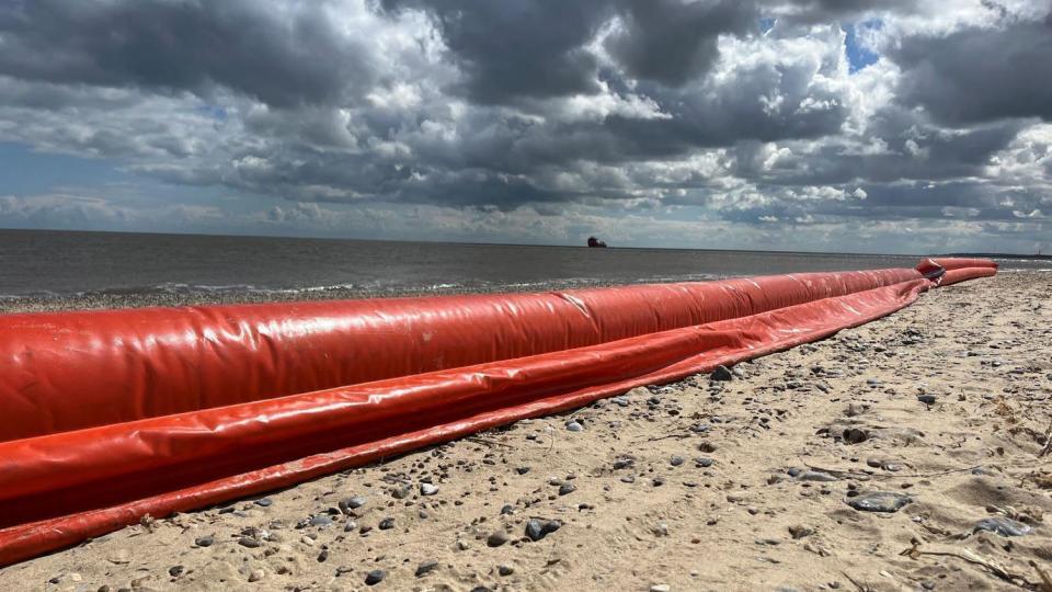 Orange inflatable equipment on Great Yarmouth beach