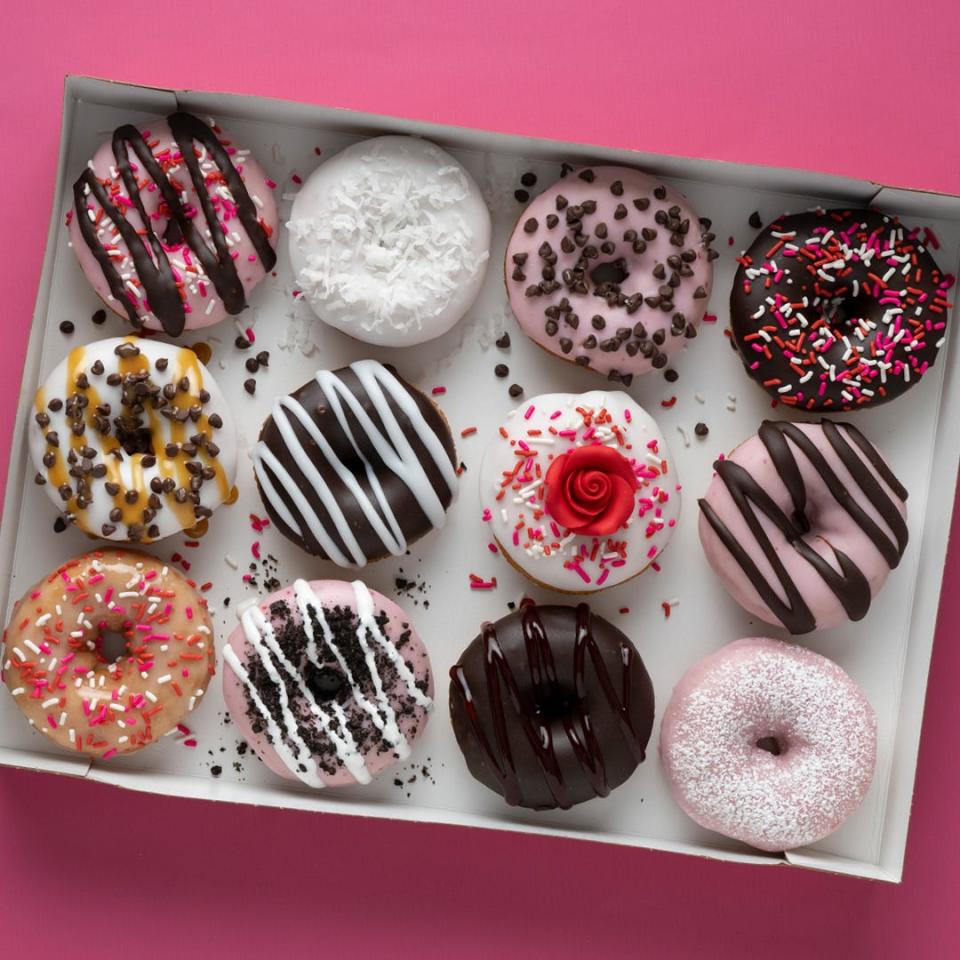 A "Love Assortment" donut box from Duck Donuts, available for Valentine's Day 2023.