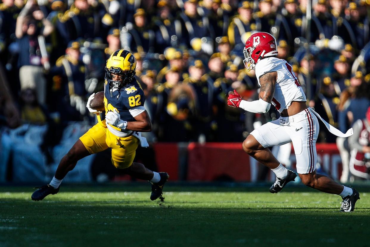 Michigan wide receiver Semaj Morgan runs against Alabama defensive back Malachi Moore during the first half of the Rose Bowl in Pasadena, California, on Monday, Jan. 1, 2024.