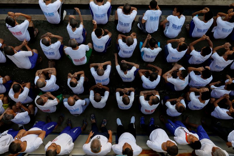 Drug rehab patients gather for a head count at the Mega Drug Abuse Treatment and Rehabilitation Center, in Nueva Ecija province, north of Manila