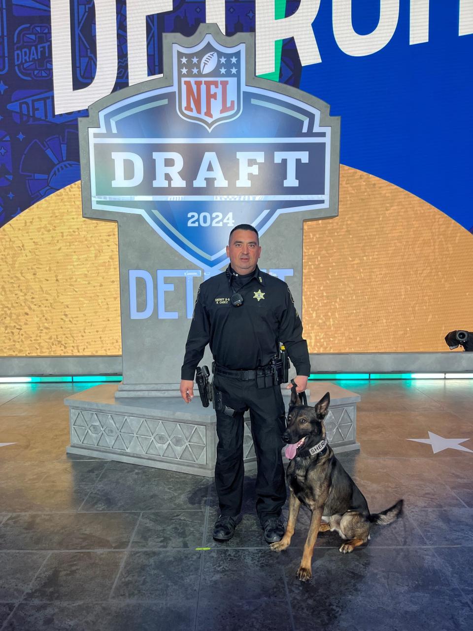 Cpl. Rick Cadez stands with his K9 partner Gunner at the 2024 NFL draft in Detroit in April. The two worked the draft April 25-27 doing mostly explosives detection.