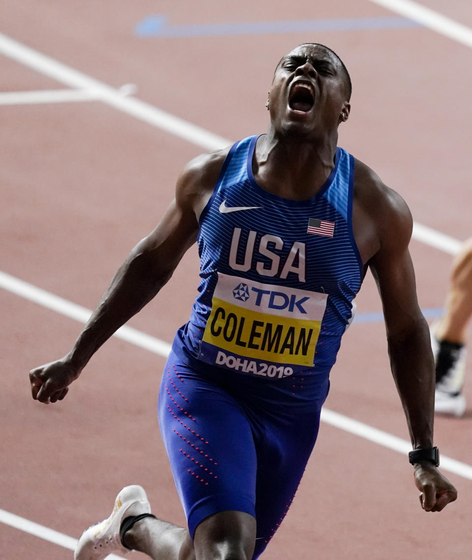 FILE - In this Sept. 28, 2019, file photo, Christian Coleman, of the United States, celebrates after crossing the line to win the gold medal in men's 100 meter final at the World Athletics Championships in Doha, Qatar. (AP Photo/Nick Didlick)