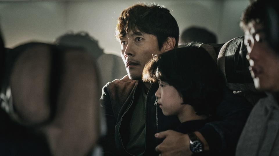 Lee Byung-hun plays a father desperate to save his son during a bioterror attack on their flight in "Emergency Declaration."