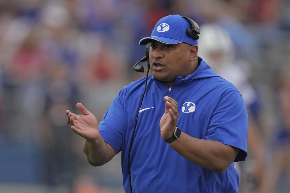 BYU coach Kalani Sitake talks to his team during game against Kansas Saturday, Sept. 23, 2023, in Lawrence, Kan. | Charlie Riedel, Associated Press