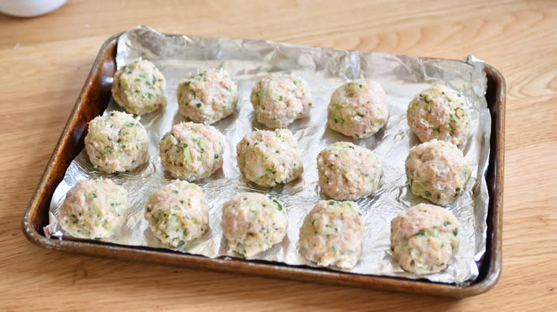 meatballs on baking sheet