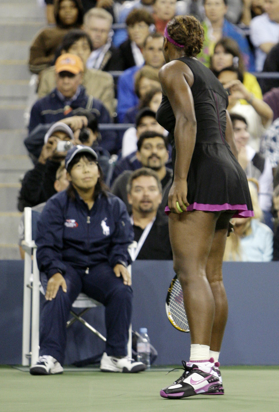 FILE - In this Saturday, Sept. 12, 2009, file photo Serena Williams, of the United States, argues with line judge Shino Tsurubuchi over a foot fault call during her match against Kim Clijsters, of Belgium, at the U.S. Open tennis tournament in New York. Williams’ dispute with the chair umpire during the 2018 U.S. Open final is the latest issue she’s had with match officials at the Grand Slam tournament. (AP Photo/Darron Cummings, File)