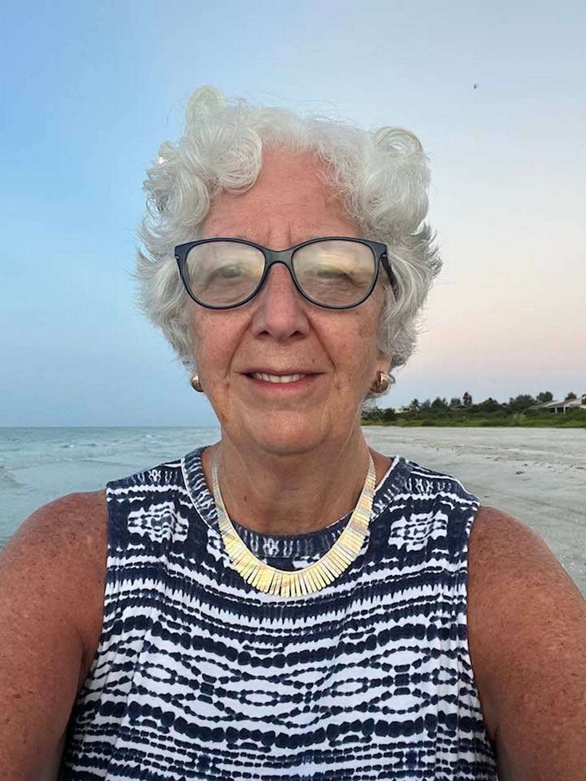 Sara McKinley on Coquina Beach, just off of Nerita Street on Sanibel, which is right near her duplex on Juniona Street, in Southwest Florida in July 2022.