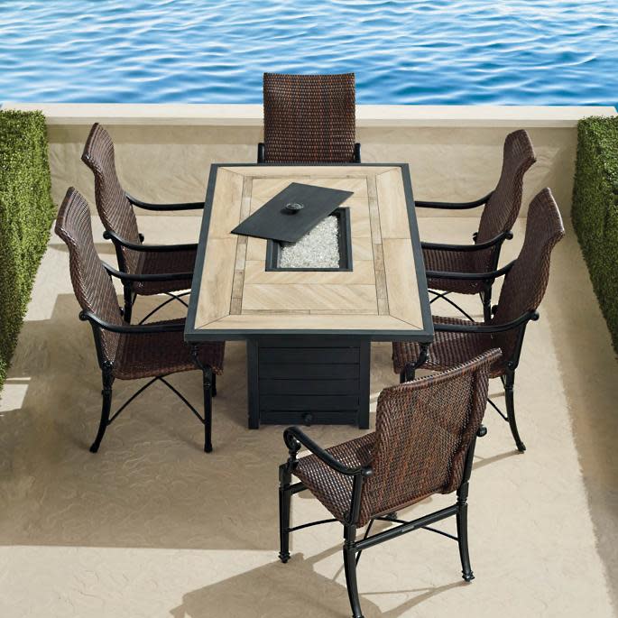 Outdoor dining table with firepit