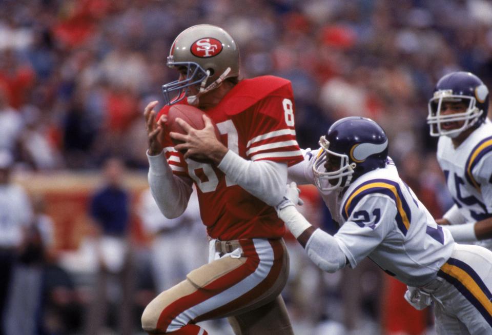 The sports world took to social media on Monday after learning that San Francisco 49ers wide receiver Dwight Clark — most famous for “The Catch” in the 1981 NFC Championship game — died after a battle with ALS. (Getty Images)