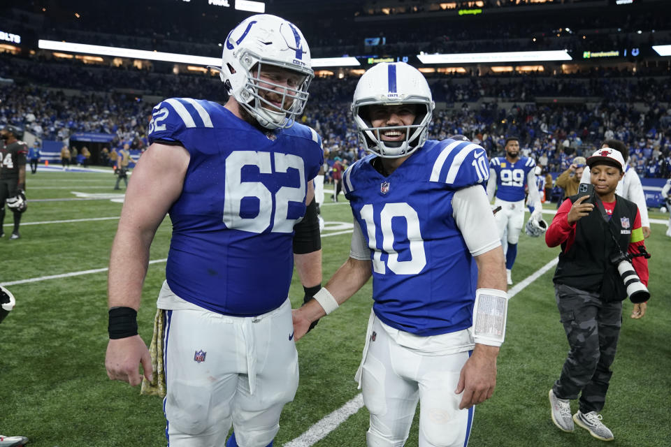 Indianapolis Colts center Wesley French (62) and quarterback Gardner Minshew (10) stand on the field after an NFL football game against the Tampa Bay Buccaneers Sunday, Nov. 26, 2023, in Indianapolis. (AP Photo/Michael Conroy)