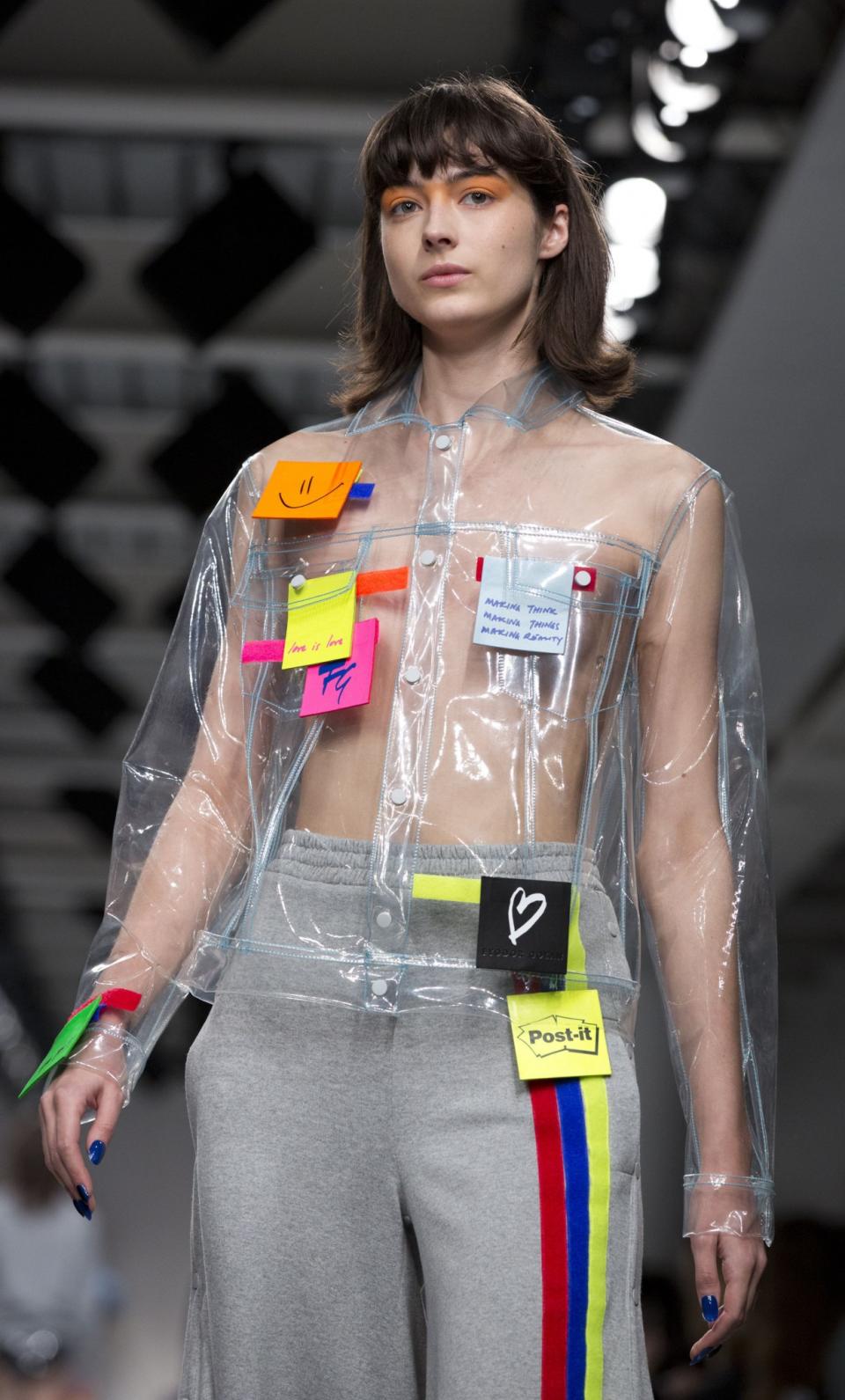 <p>Post-it note covered plastic shirts were debuted at Fyodor Golan. Somehow we can’t quite see this working on the high street… [Photo: PA] </p>