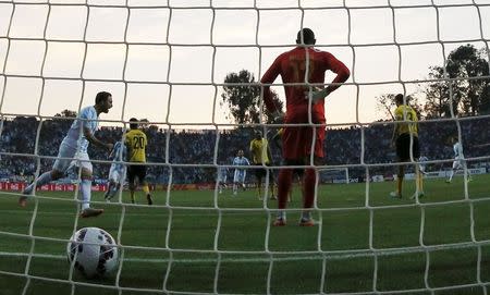 Argentina's Gonzalo Higuain (L) celebrates after scoring past goalie Jamaica's goalie Dwayne Miller during their first round Copa America 2015 soccer match at Estadio Sausalito in Vina del Mar, Chile, June 20, 2015. REUTERS/Ivan Alvarado