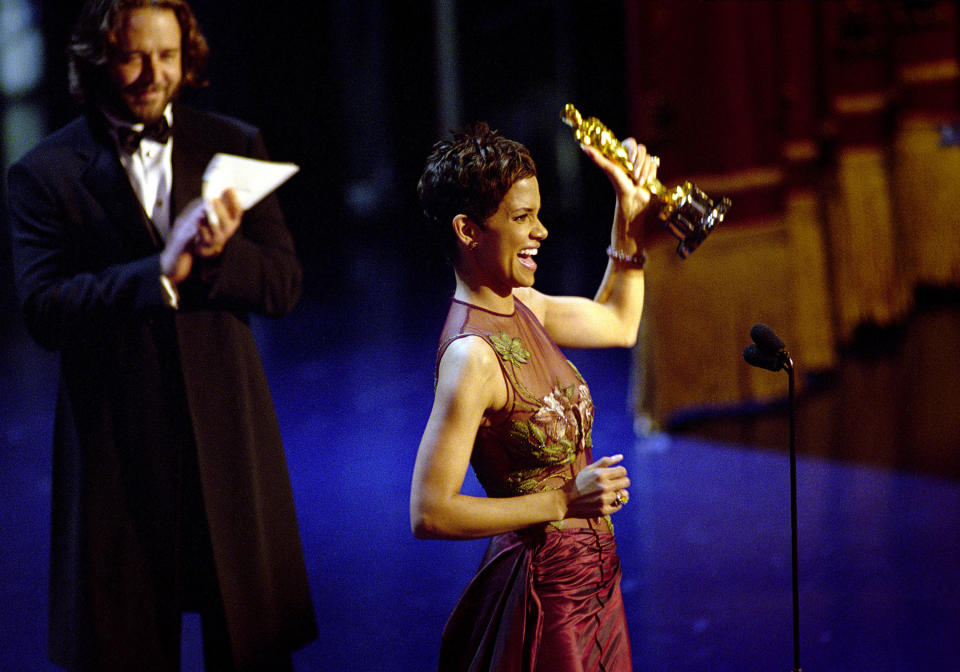 American actress Halle Berry accepts the Academy Award for Best Actress for her performance in 