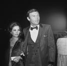 <p>Adam West, who plays television’s Batman, and Barbara Parkins of “Peyton Place” arrive for the premiere of “The Blue Max” in Hollywood, June 28, 1966. (Photo: Harold P. Matosian/AP) </p>